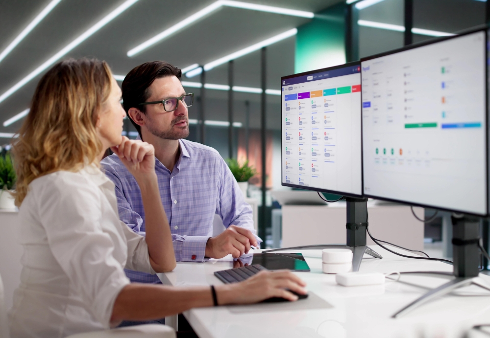 Recruiter reaching out to a passive candidate using personalized outbound hiring strategies on a laptop.
