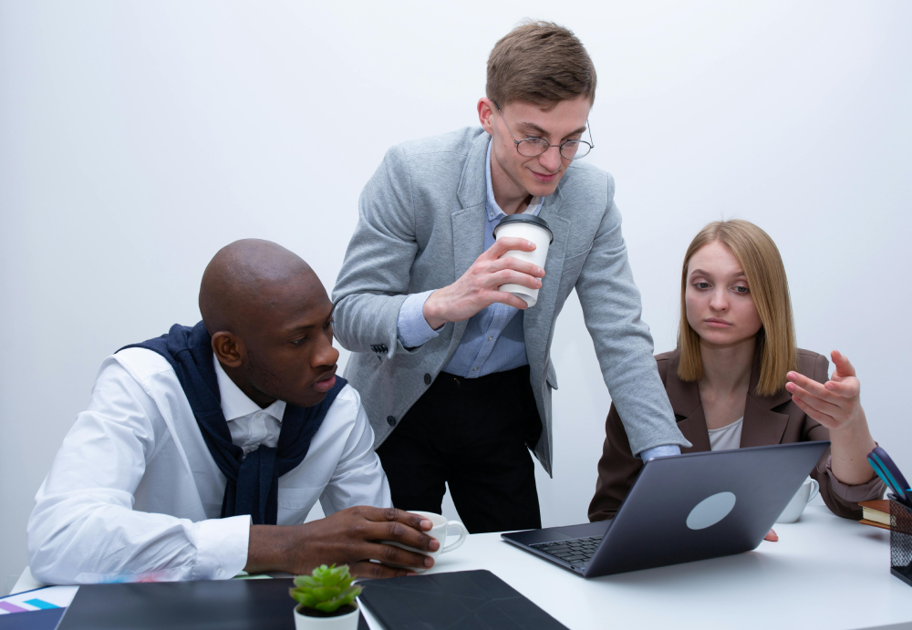 Team members discussing workplace policies and employee concerns during an office meeting